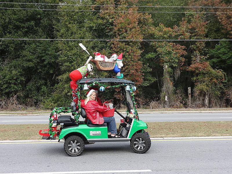 Couple in Christmas Golf Cart